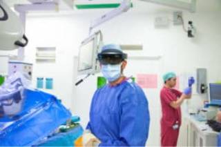 surgeons in blue gown