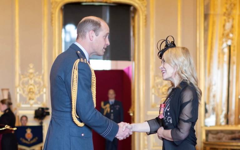 Professor Rachel Batterham and Prince William OBE award Windsor