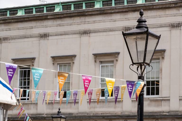 Multicoloured bunting advertising UCL Open Day