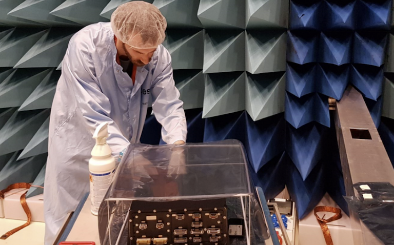 MSSL's Kyle Silliman with the preparing the EUI central electronics box flight model for testing at ESTEC,