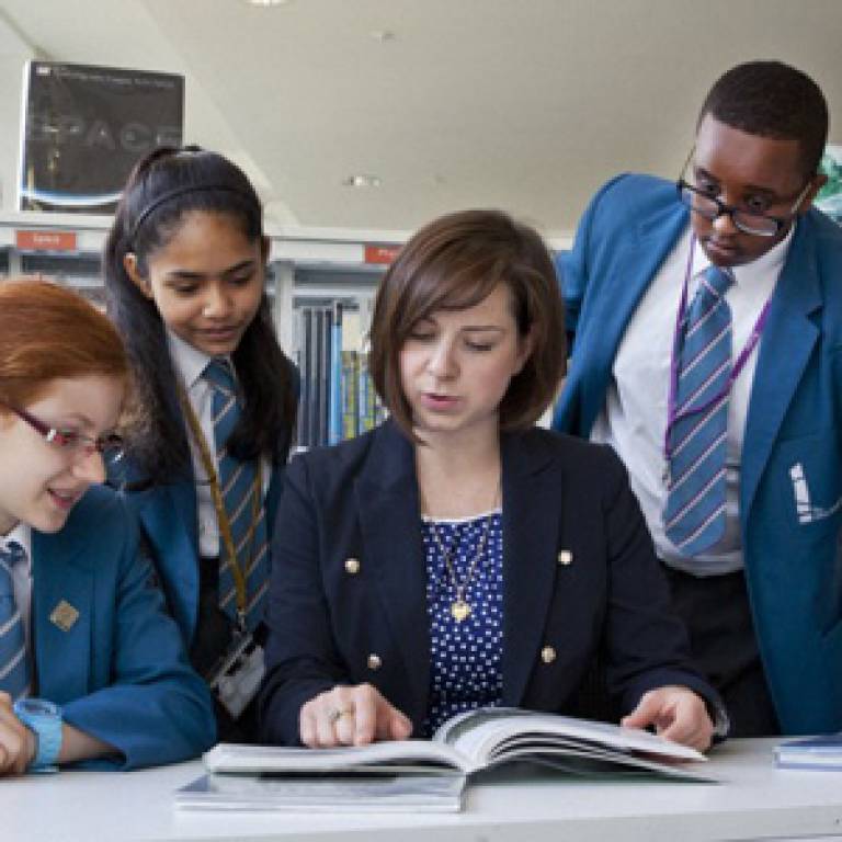 Paula Kearney, UCL Academy teacher, talking to pupils (from left to right) Patricia Markauskaite, Enaya Ali and Haroon Hussein (credit: Wellcome Trust)