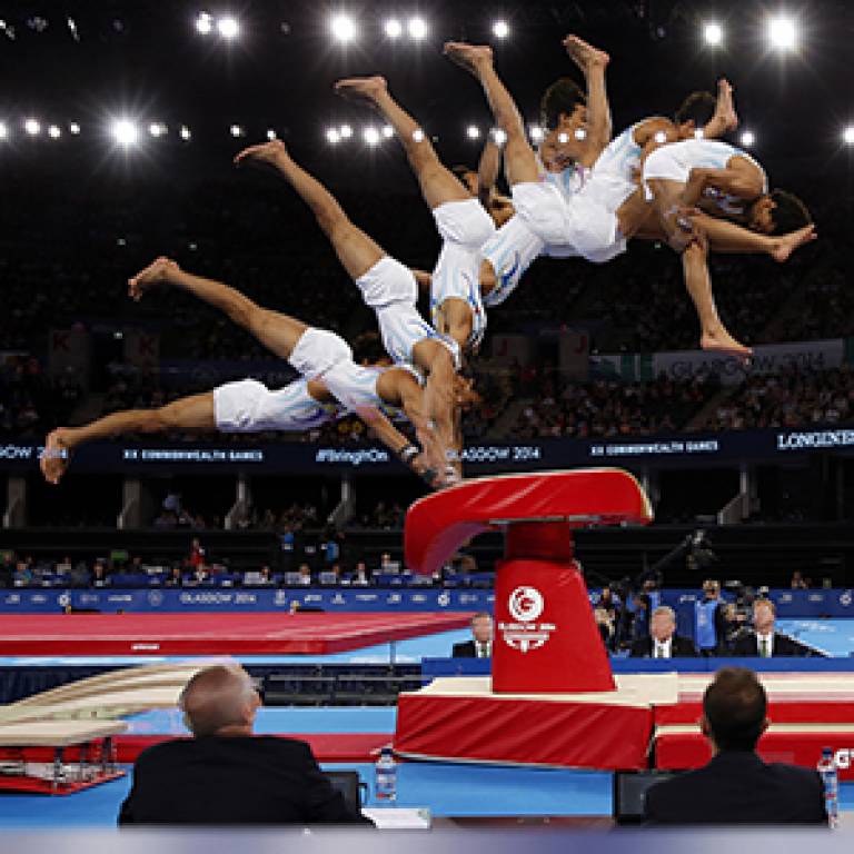 Anand Patel on the vault during competition at the Games