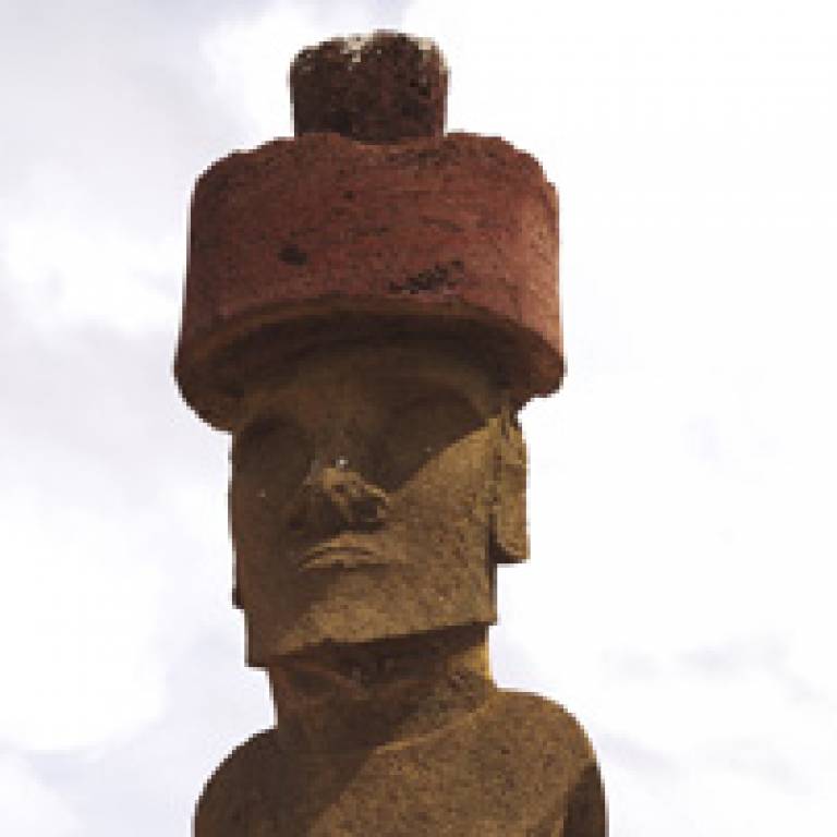Easter Island statue with distinctive red 'hat'