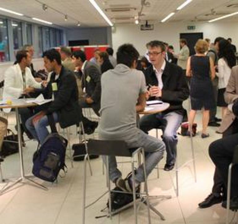Preople networking at a conference