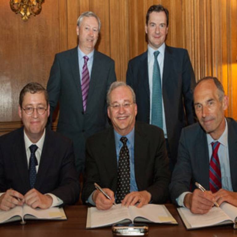 The signing: (standing from left) Martin Curley, VP and Director Intel Labs Europe; Rt Hon George Osborne, UK Chancellor of the Exchequer,  and seated, Professor Stephen Caddick, Vice-Provost (Enterprise) UCL; Dr Justin Rattner, CTO, Vice-President …