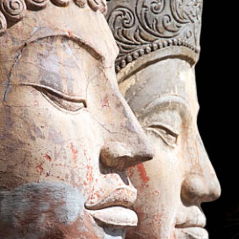Two buddha heads