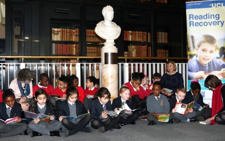 children reading at UCL library