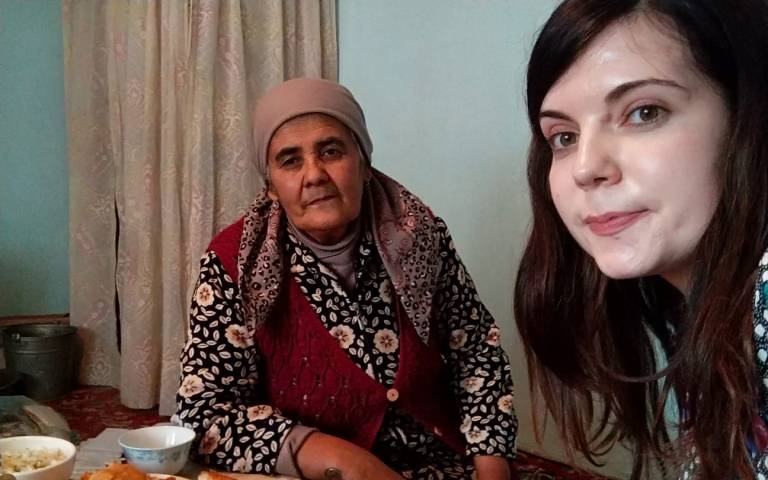 •	Marina Shupac and Khadicha Askarova take selfies after their first encounter in Bazar-Korgon town, Kyrgyzstan, in December 2019.