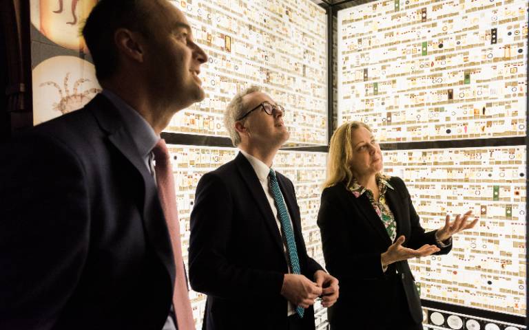From Left: Paul Ramsbottom, CEO Wolfson Foundation, Lord Parkinson Minister for Arts and Tannis Davidson, Head of Zoology and Science Collections, UCL examine the museum’s Micrarium displaying 2,323 tiny specimens mounted on 252 microscope slides