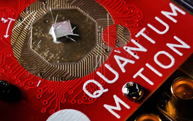 A computer chip with "Quantum Motion" written on it