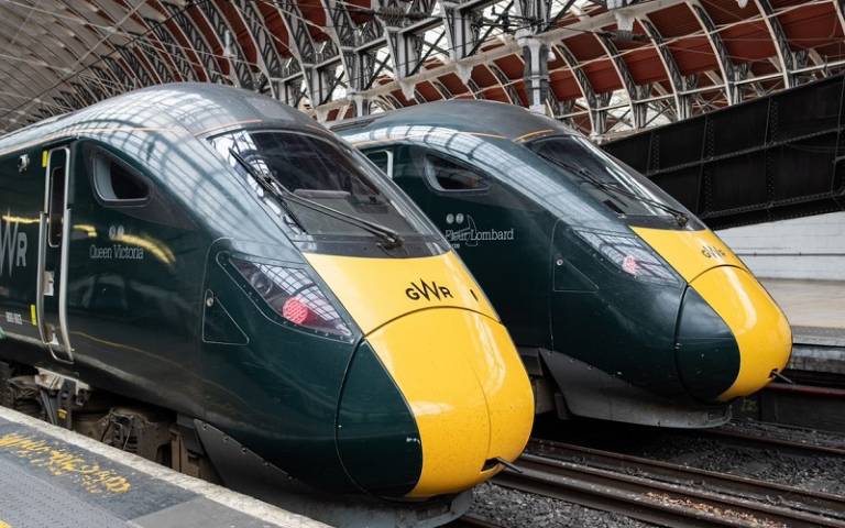 Two high-speed trains waiting in the platform at a London railway station