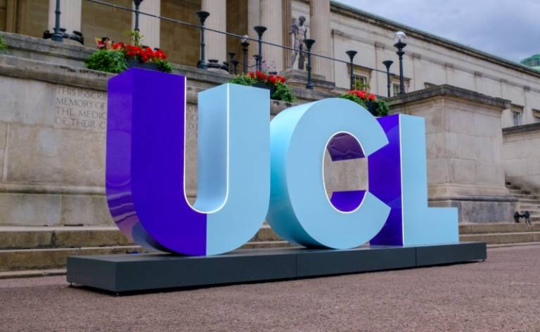 UCL sign in blue colour in front of the main quad.