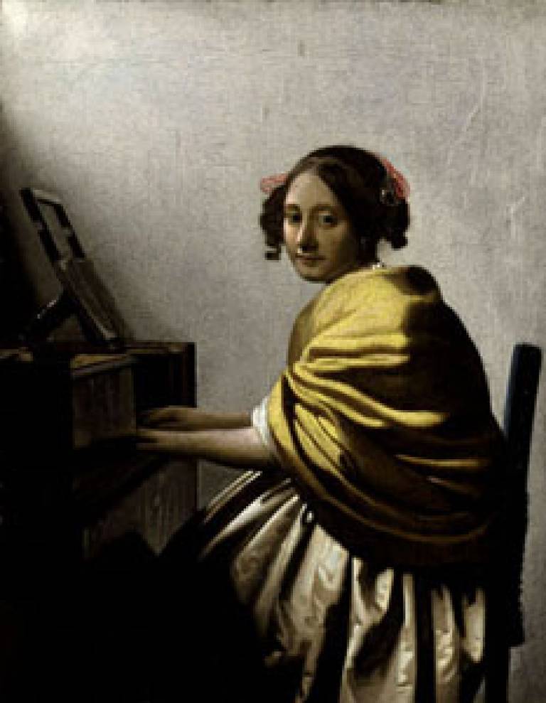 Young Woman Seated at the Virginals by Vermeer