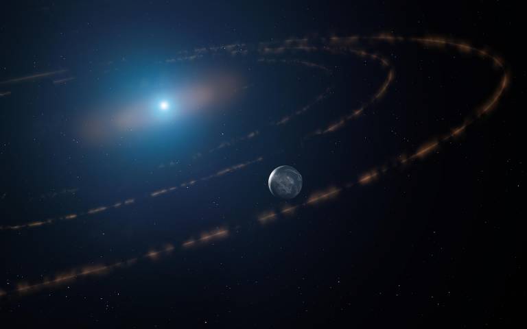 An artist’s impression of the white dwarf star WD1054–226 orbited by clouds of planetary debris and a planet in the habitable zone.