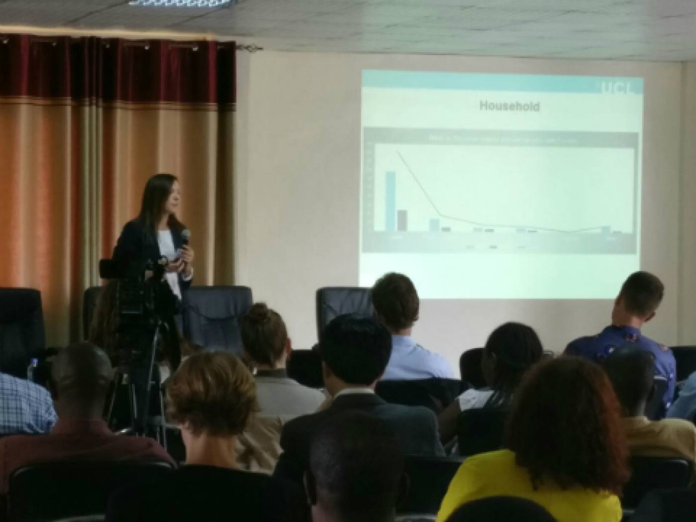 UCL USAR PhD student Iwona Bisaga presenting initial findings of her research focusing on SHS users in Rwanda.