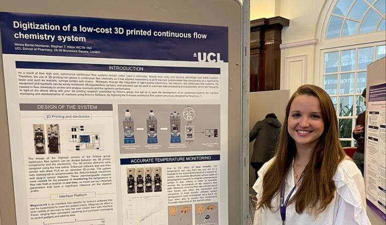 Mireia Benito Montaner standing next to her poster at the School of Pharmacy PhD Research Day
