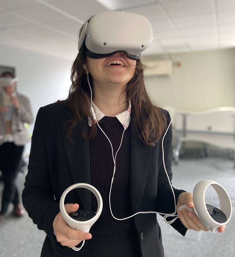 Student using VR headset.