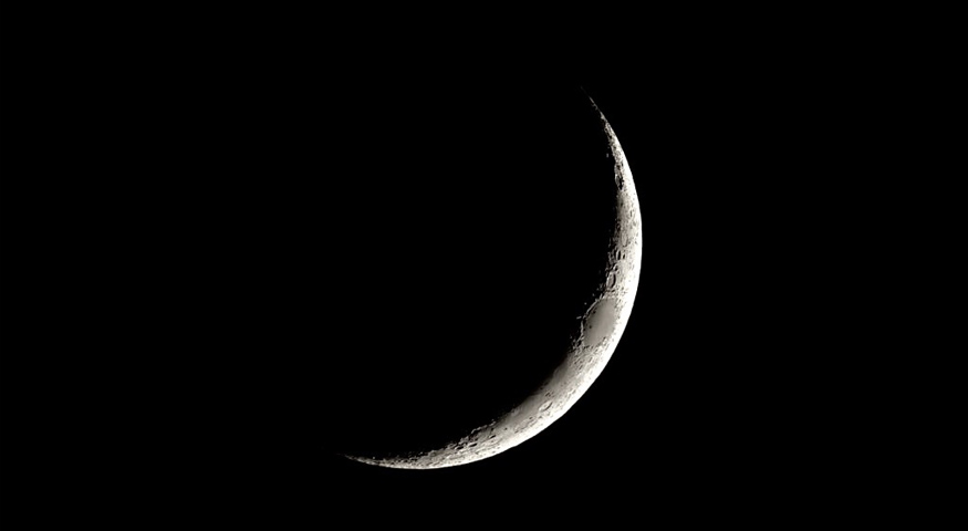 Telescopic images of the same crescent Moon