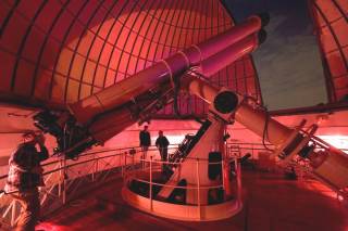 Mature students using the Radcliffe refracting telescope at the UCL Observatory