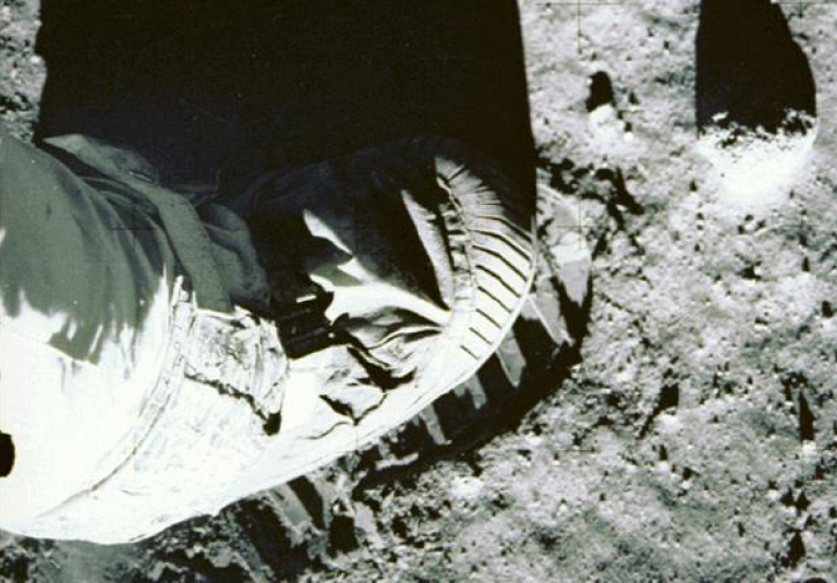 Close-up of the lunar regolith with astronaut’s boot for scale (credit: NASA)
