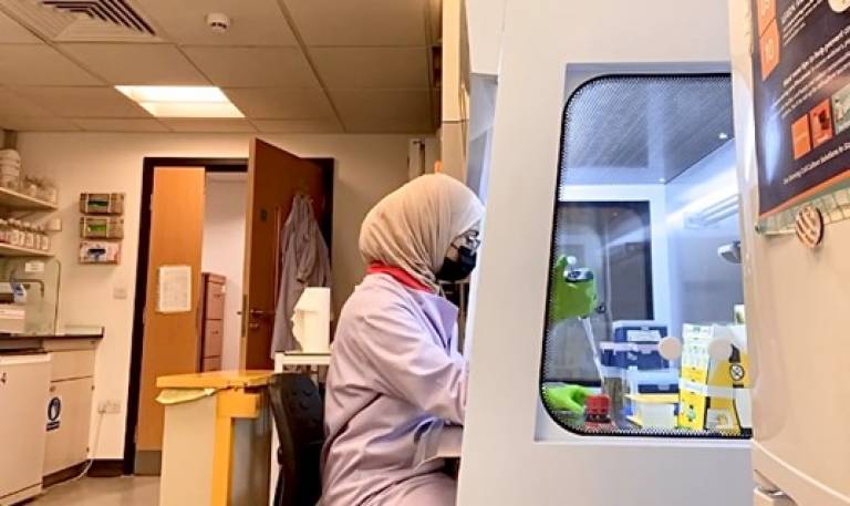 Student Sumayyah Tahsin at work in a lab.