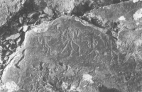 A scene with human figures believed to date to the bronze age