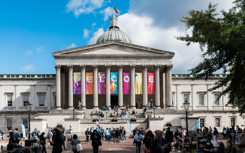 UCL Portico building with welcome sign between columns.