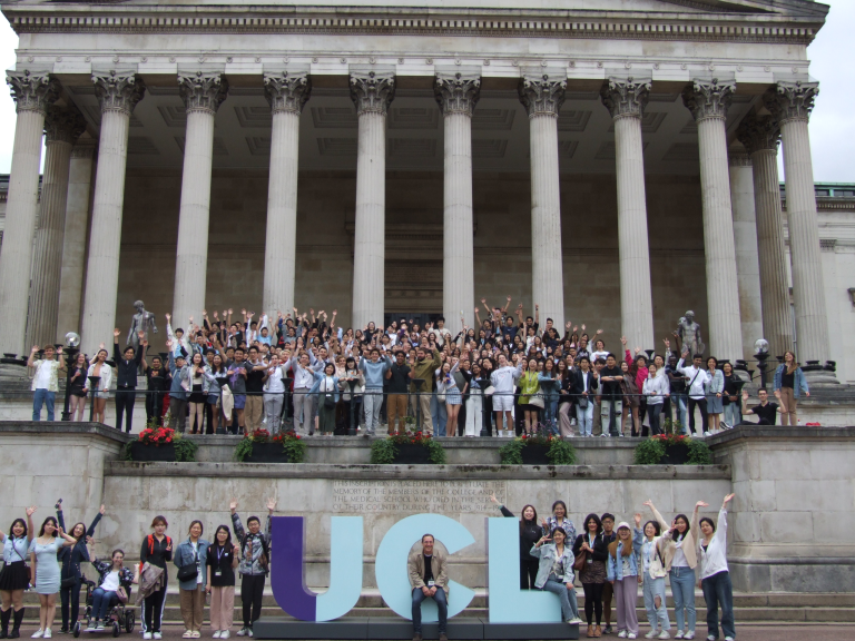 2023 Summer School cohort in front of the Portico