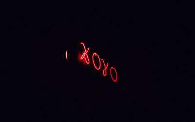 Red neon XOYO signage.