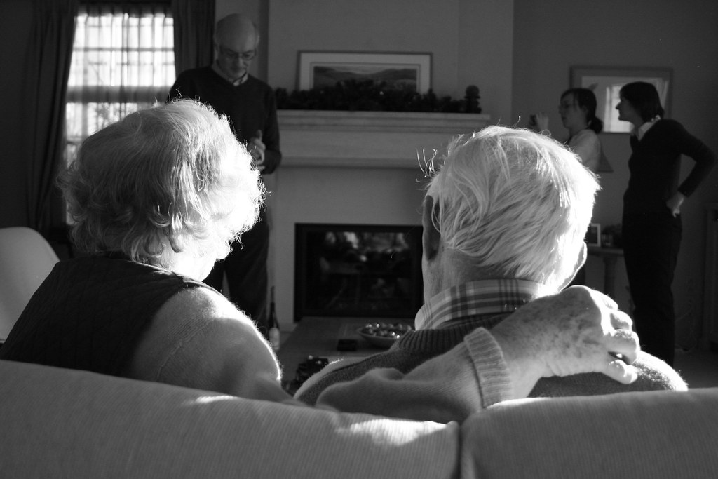 Two older people on a sofa