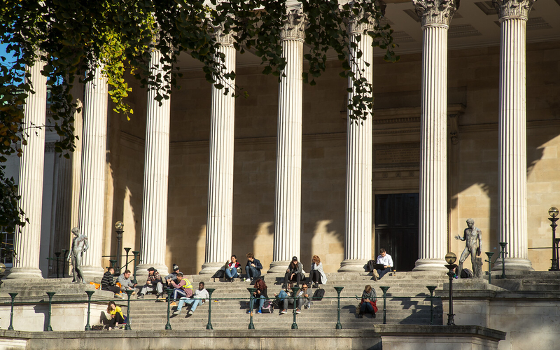 People sitting on UCL Portico steps