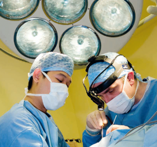 Surgeons operating in OR