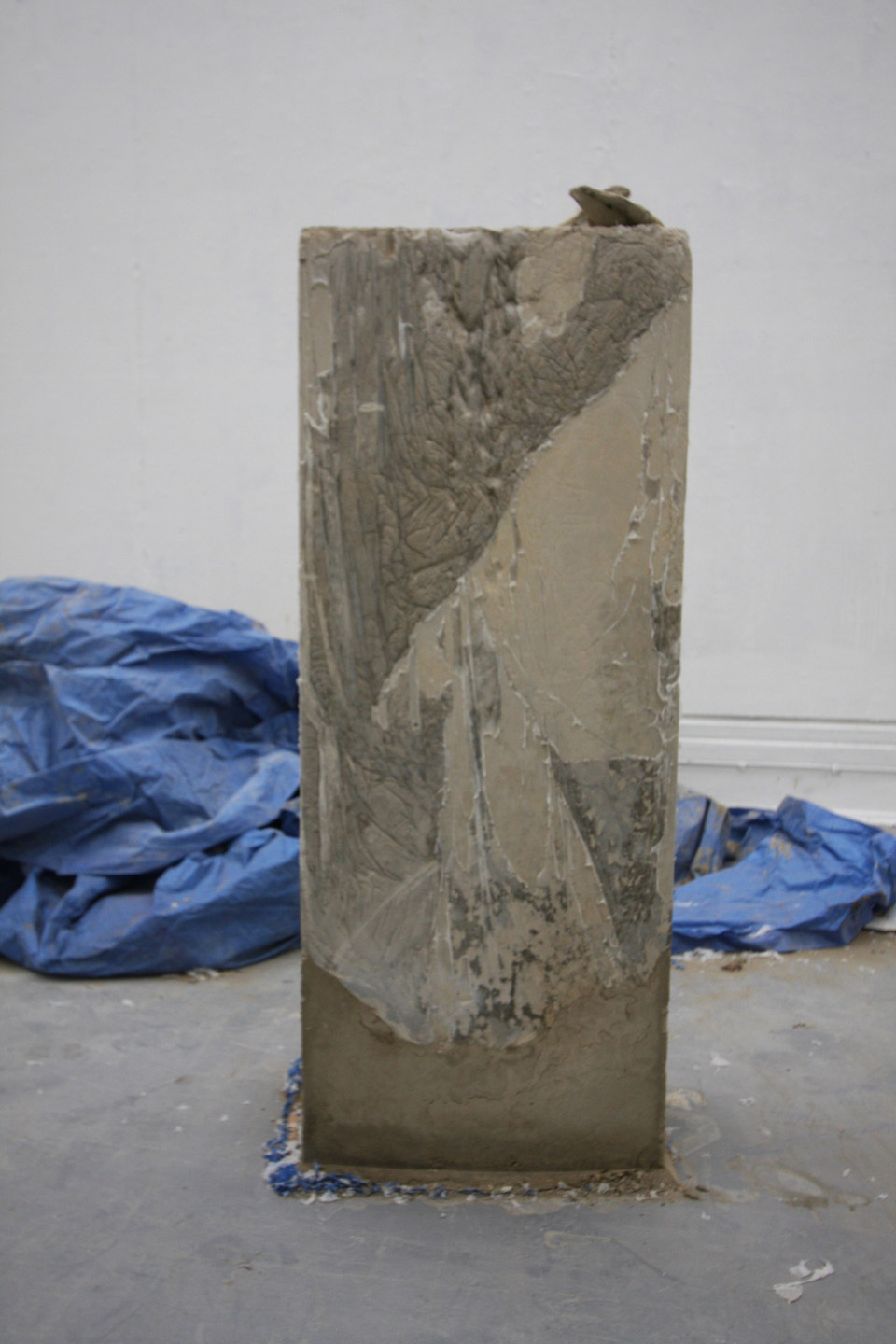 <p>The Heaviest Plinth In The World, 2013, concrete and dust sheet, 2  x 0.5 m</p>