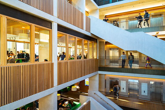 An image of  several staircases inside the UCL student centre