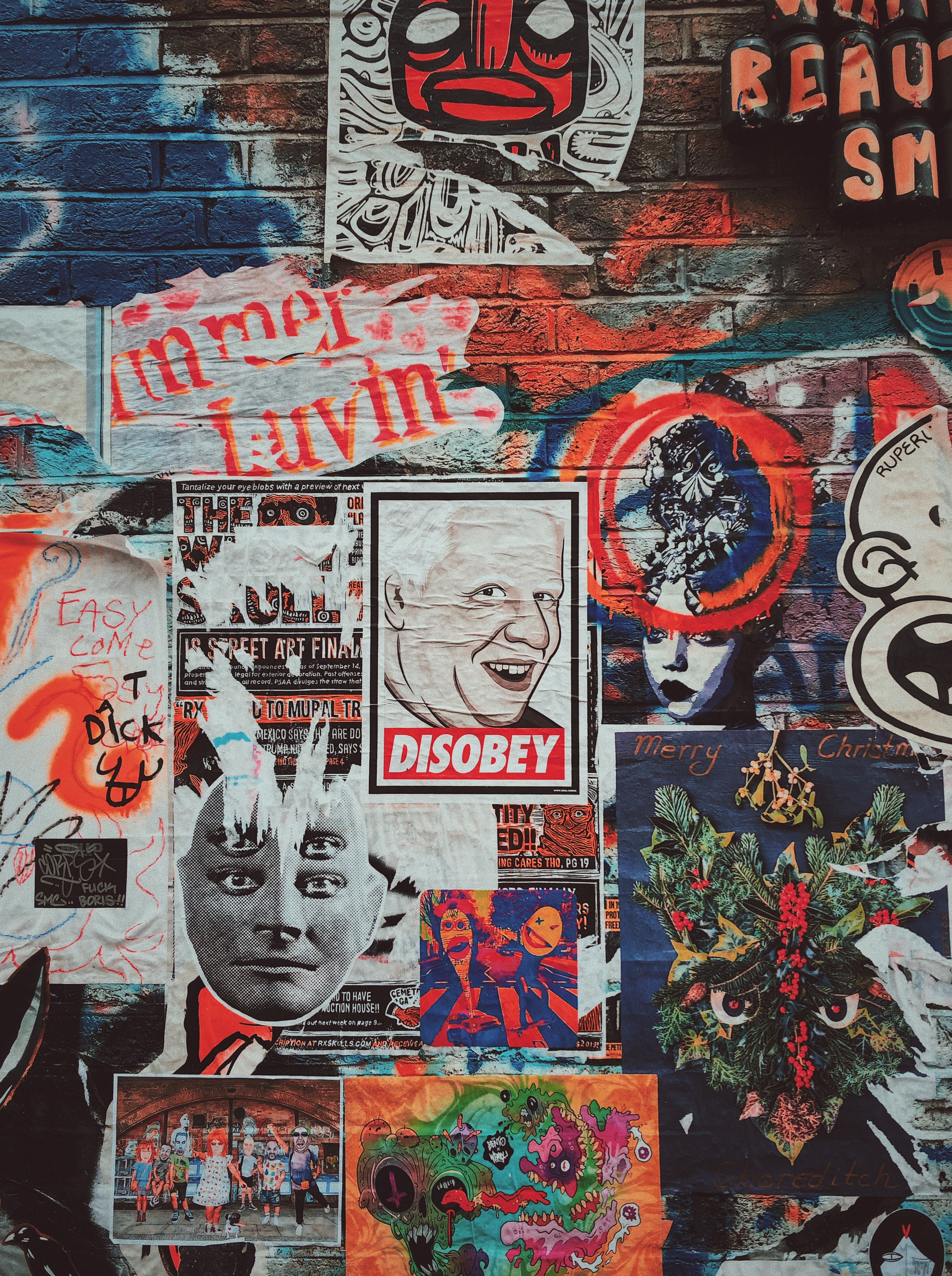 Graffiti and posters on Brick Lane, London