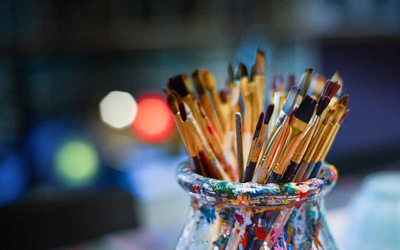Paint brushes in jar