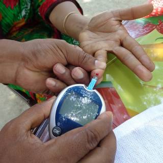 Diabetes testing machine and hands