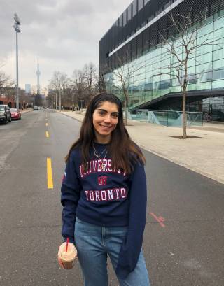 Sophia wearing "University of Toronto" hoodie