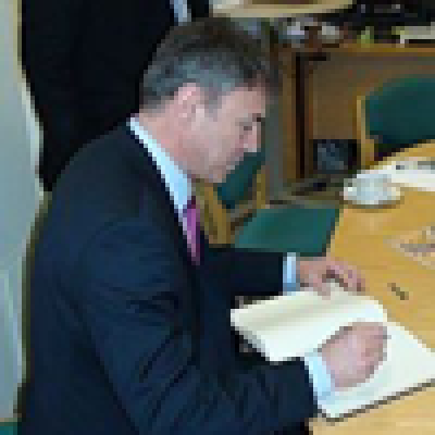 Bulgarian Minister of Education, Sergei Ignatov, signs the visitor's book.…