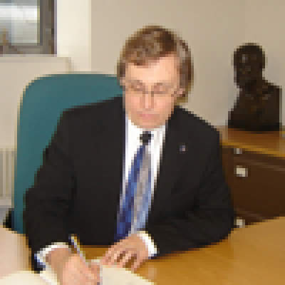 Dr Tõnis Lukas signs the Visitor's Book during his visit to SSEES…
