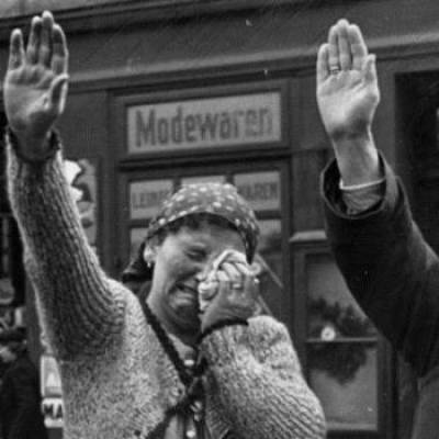 People of Cheb salute german troops entering the town in October 1938…