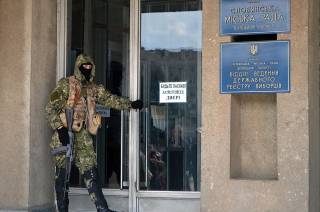 ussian-led fighter in front of Sloviansk City Council on 14 April 2014