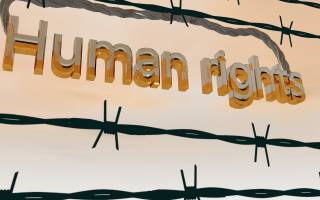 Human rights sign with a barbed wire