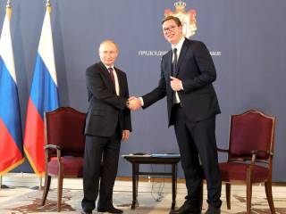 Serbia putin handshake 