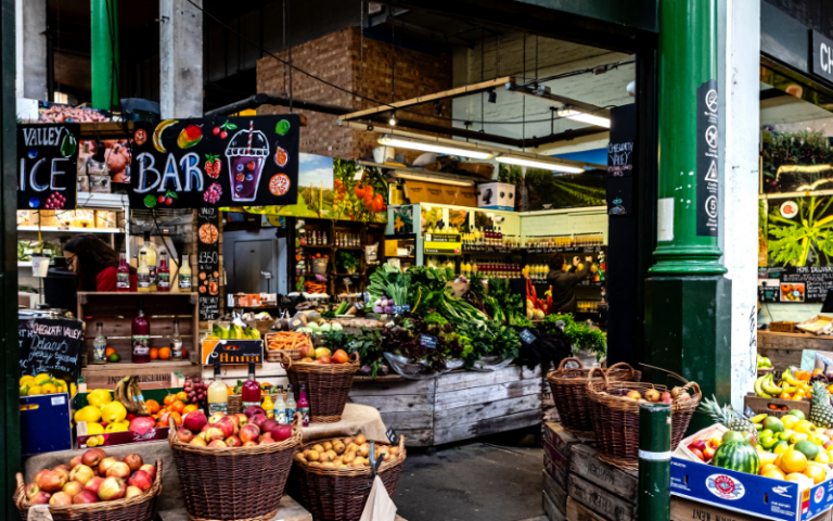 A borough market stall with fresh fruit and vegetables