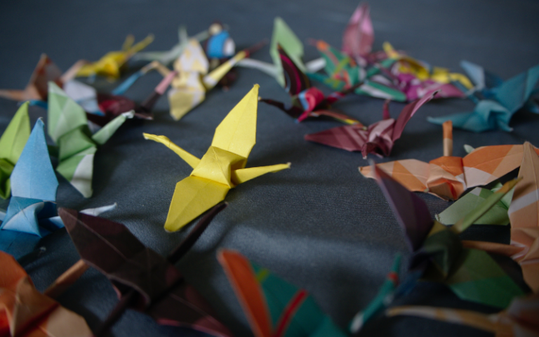 Origami cranes in different colours