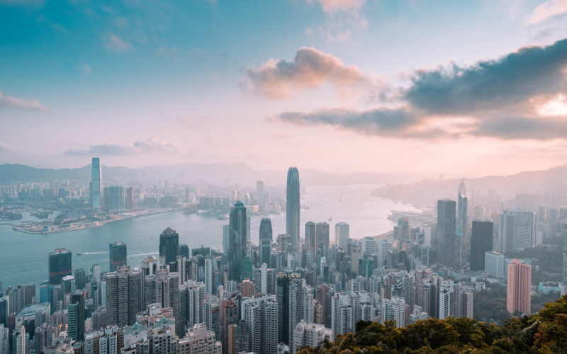 hong kong cityscape with clouds and skyscrapers