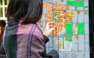 Student looking at campus map