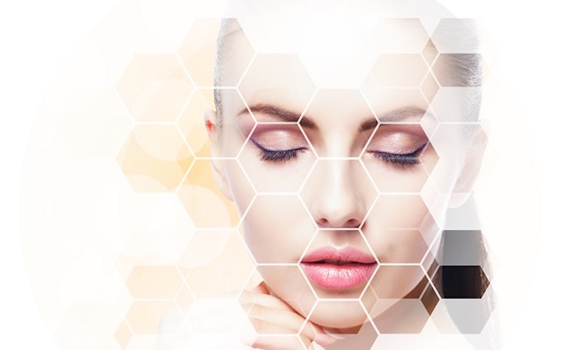 Concept image of female model overlaid with pattern of transparent hexagon