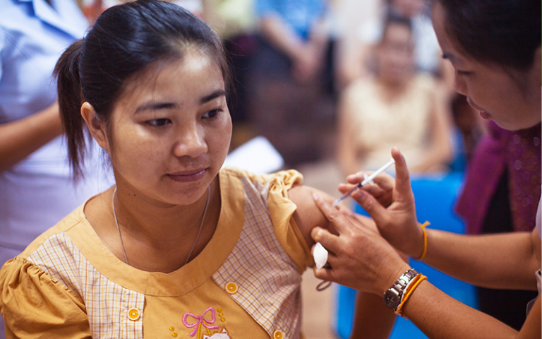 An image of a woman having an injection